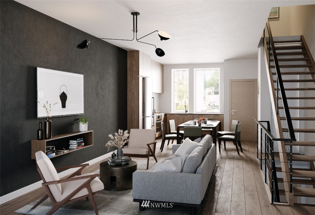 63 East Lynn Street Seattle, WA 98102 - Photo 2 of 20 a living room with furniture and a large window