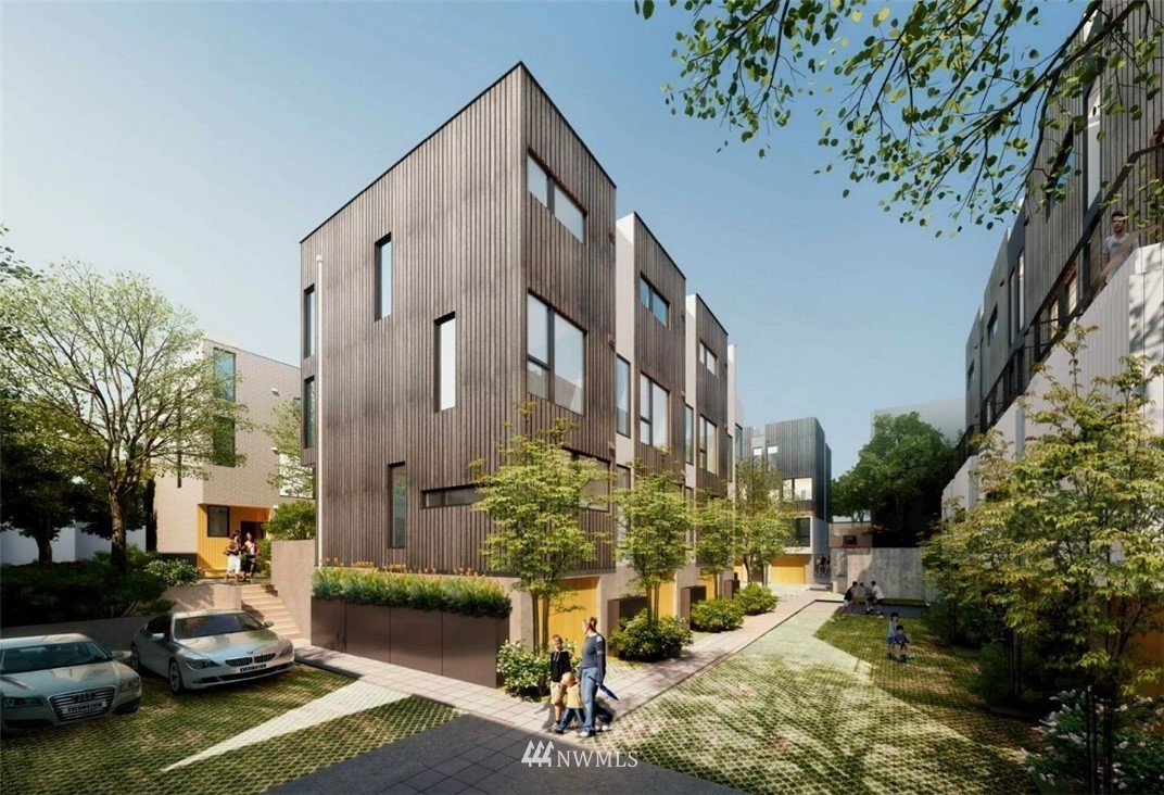 63 East Lynn Street Seattle, WA 98102 - Photo 14 of 20 a view of a patio with couches table and chairs and potted plants