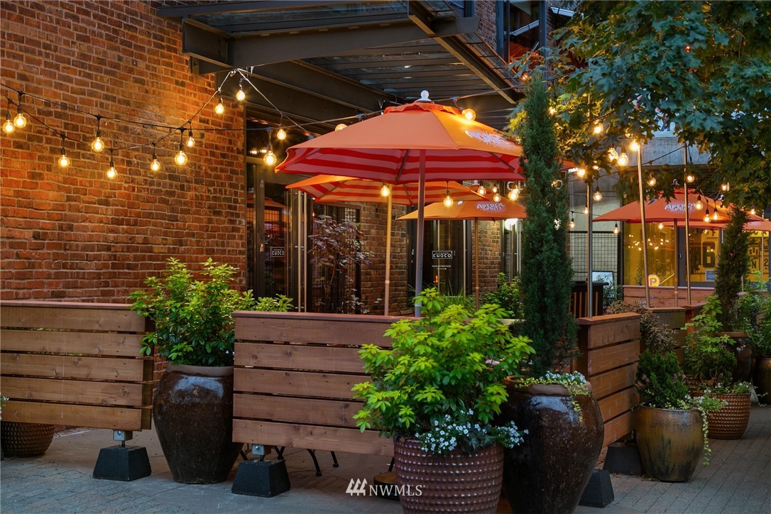 63 East Lynn Street Seattle, WA 98102 - Photo 18 of 20 a view of a chair and table in the patio