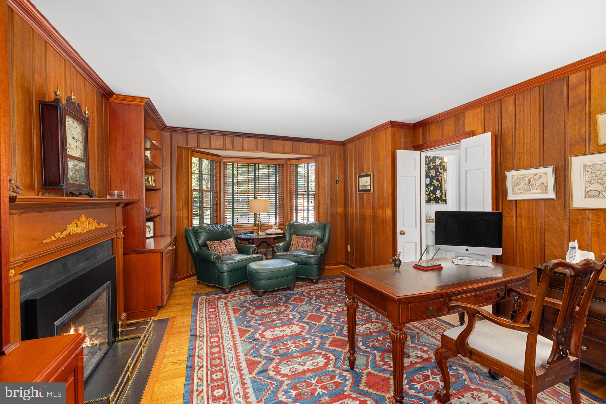 3730 Cardiff Road Chevy Chase, MD 20815 - Photo 21 of 49 a workspace with furniture and a fireplace