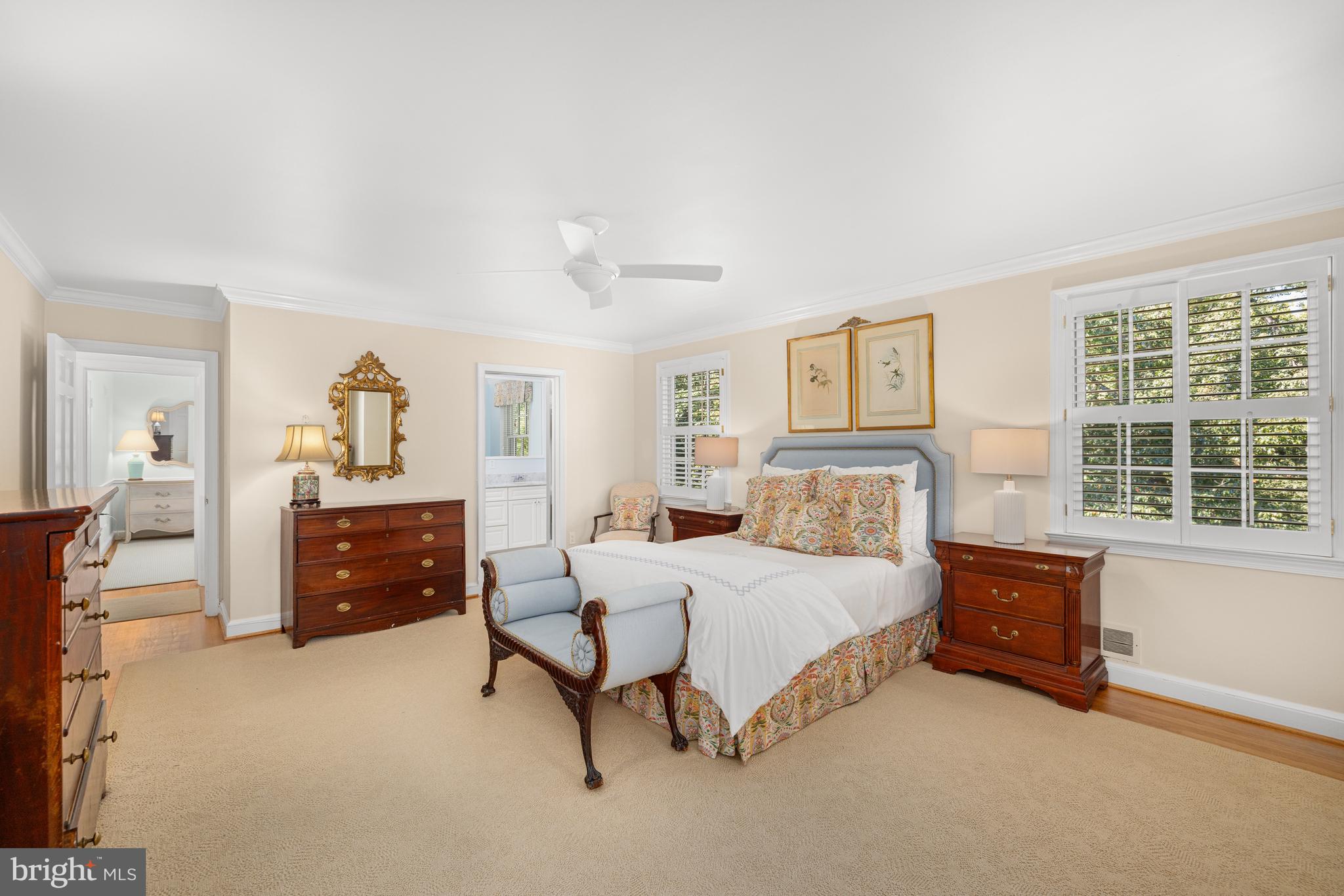 3730 Cardiff Road Chevy Chase, MD 20815 - Photo 23 of 49 a bedroom with a bed and a dresser next to a window
