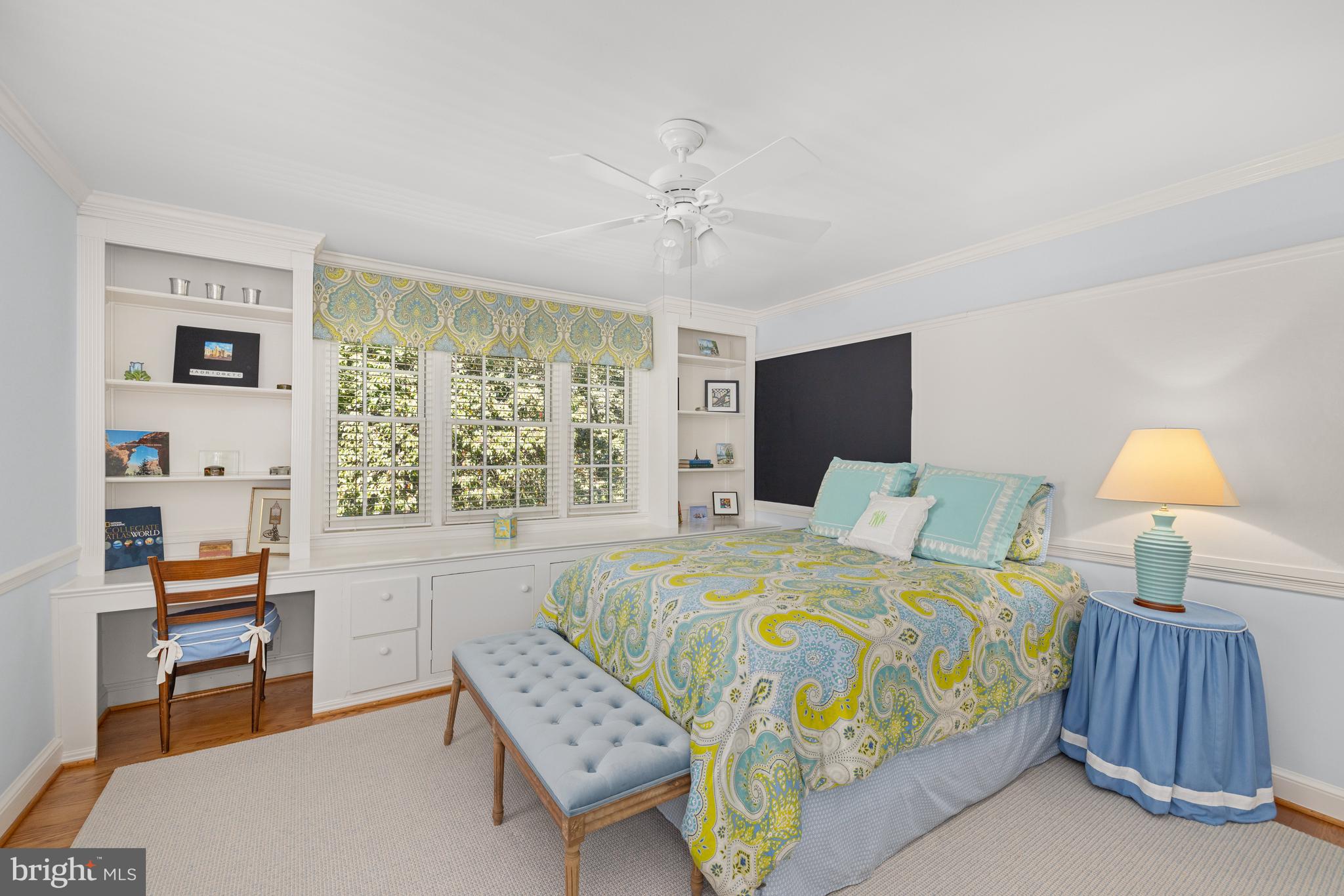 3730 Cardiff Road Chevy Chase, MD 20815 - Photo 27 of 49 a bedroom with a bed and a dresser with bookshelf