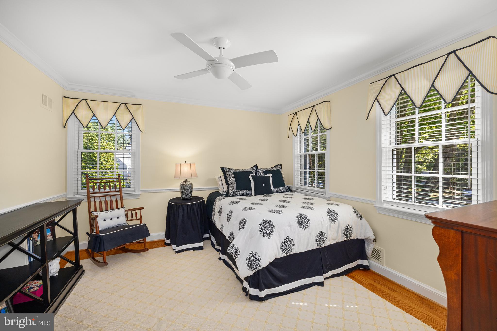 3730 Cardiff Road Chevy Chase, MD 20815 - Photo 31 of 49 a bedroom with a bed couch and a window