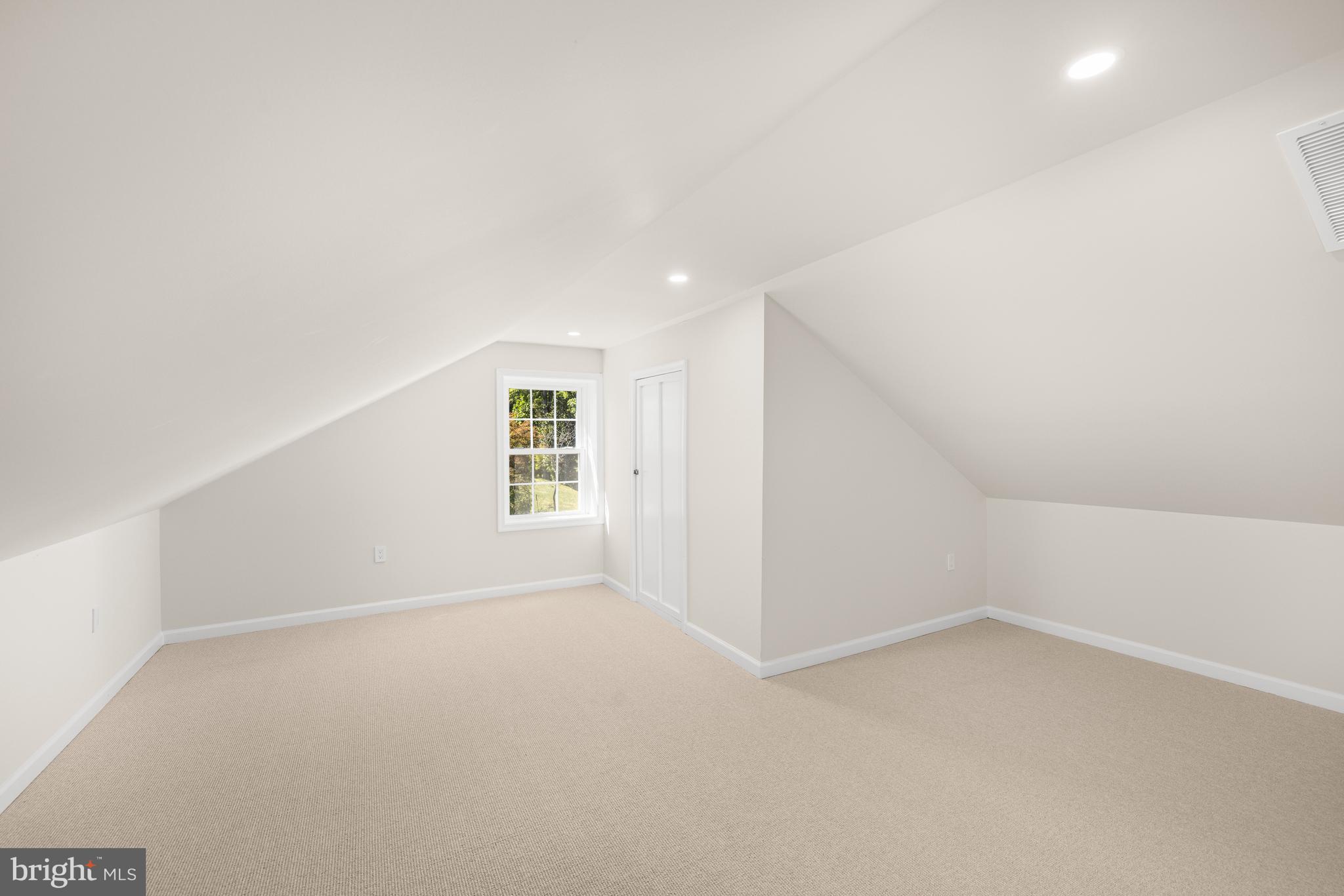 3730 Cardiff Road Chevy Chase, MD 20815 - Photo 33 of 49 an empty room with a empty space and windows