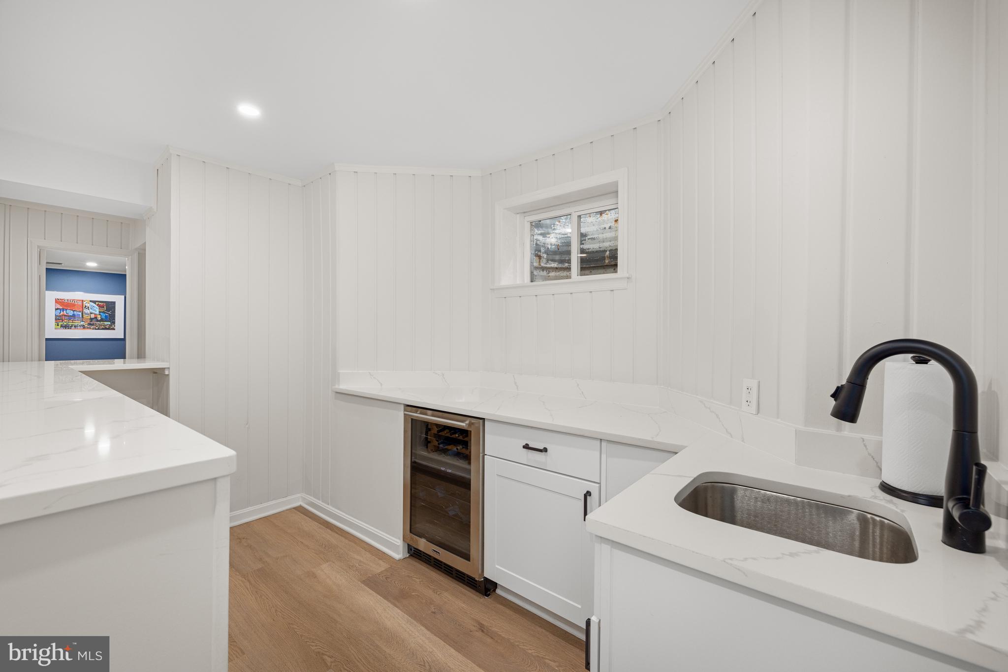 3730 Cardiff Road Chevy Chase, MD 20815 - Photo 40 of 49 a kitchen with a sink and a stove top oven