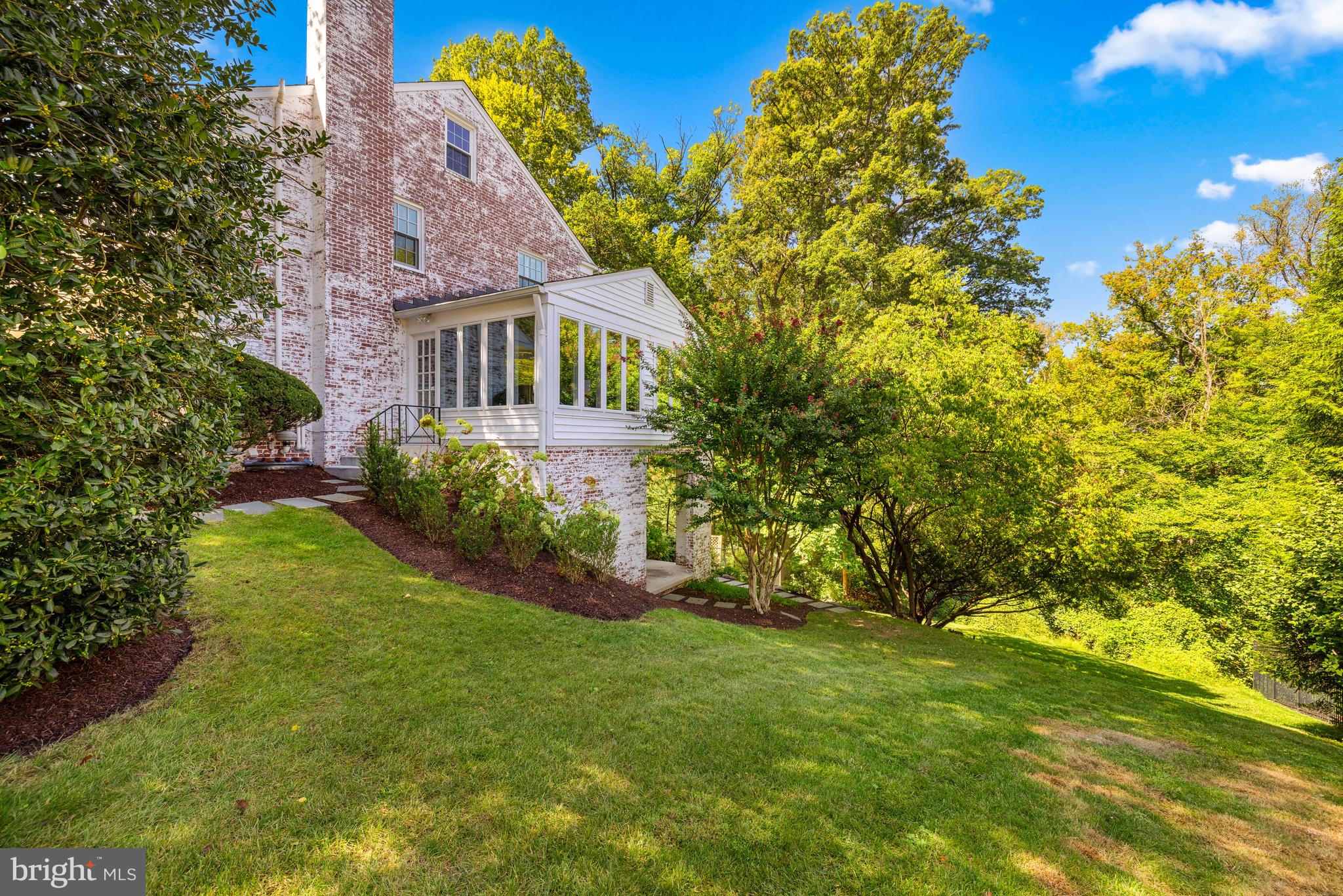 3730 Cardiff Road Chevy Chase, MD 20815 - Photo 45 of 49 a view of a house with a garden