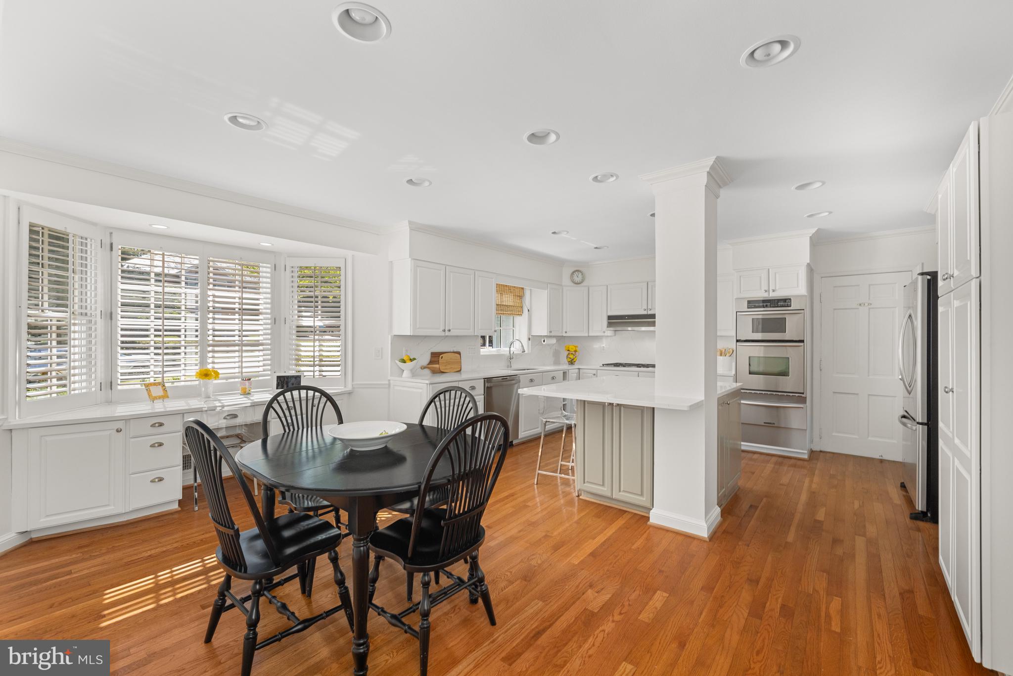3730 Cardiff Road Chevy Chase, MD 20815 - Photo 5 of 49 a view of a dining room with furniture window and wooden floor