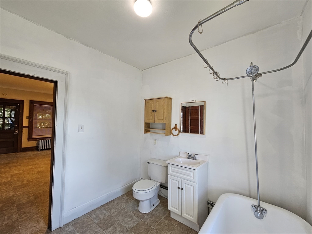 30 Bemis Street, Unit 3 Chicopee, MA 01013 - Photo 17 of 26 a bathroom with a sink toilet and shower