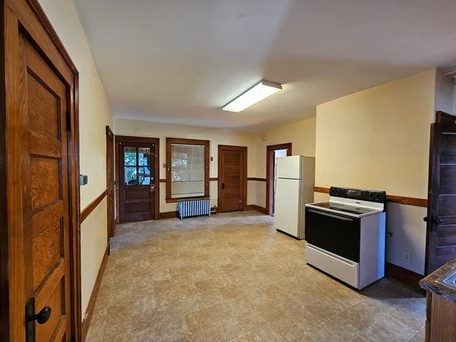 a view of a kitchen with a sink