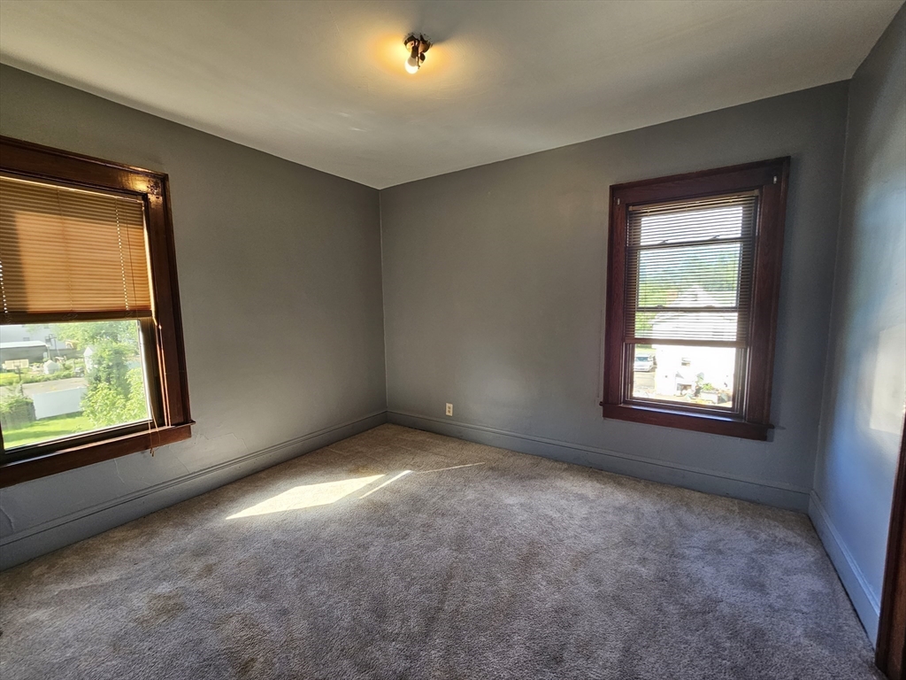 30 Bemis Street, Unit 3 Chicopee, MA 01013 - Photo 21 of 26 a view of an empty room with a window