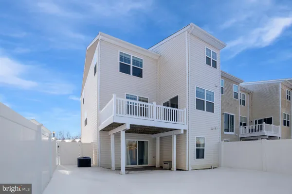 a front view of a house with a garage