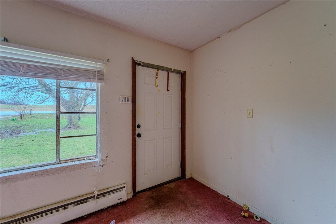 5839 Shaker Road Franklin, OH 45005 - Photo 4 of 18 This inviting entryway offers natural light and a welcoming atmosphere.