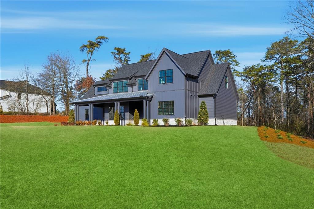 157 Palisade Drive Rydal, GA 30171 - Photo 3 of 67 a front view of a house with a garden