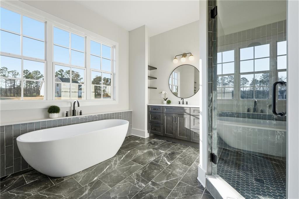 157 Palisade Drive Rydal, GA 30171 - Photo 31 of 67 a large tub sitting next to a window