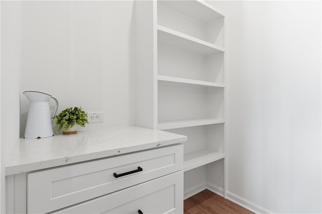 157 Palisade Drive Rydal, GA 30171 - Photo 51 of 67 a close view of kitchen island with cabinets and wooden floor