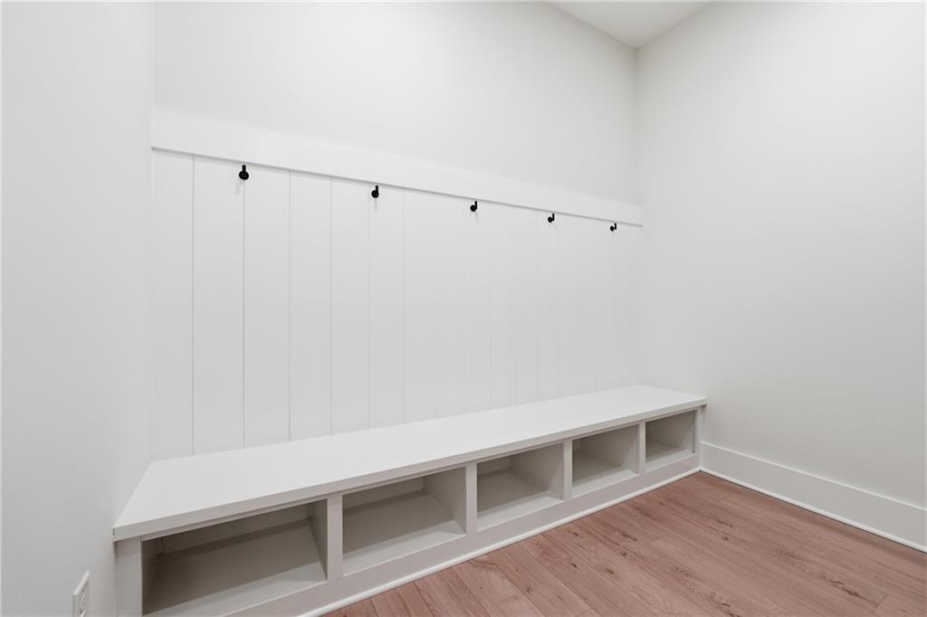 157 Palisade Drive Rydal, GA 30171 - Photo 52 of 67 a view of an empty room with wooden floor