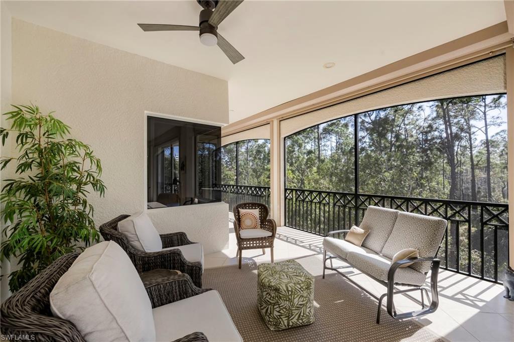 2870 Castillo Court, Unit 103 Naples, FL 34109 - Photo 20 of 34 a living room with furniture and a window