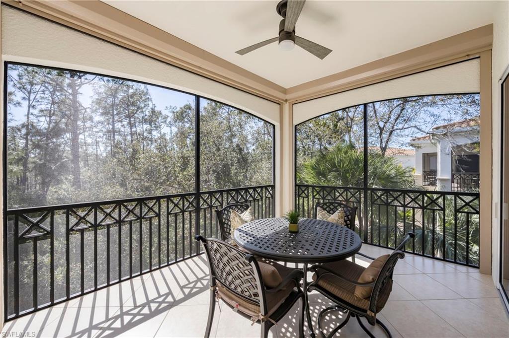 2870 Castillo Court, Unit 103 Naples, FL 34109 - Photo 21 of 34 a view of a city from a dining room