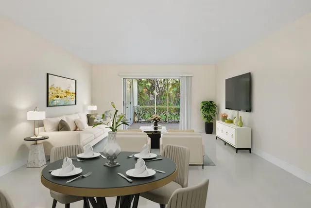 a living room with fireplace furniture and a flat screen tv