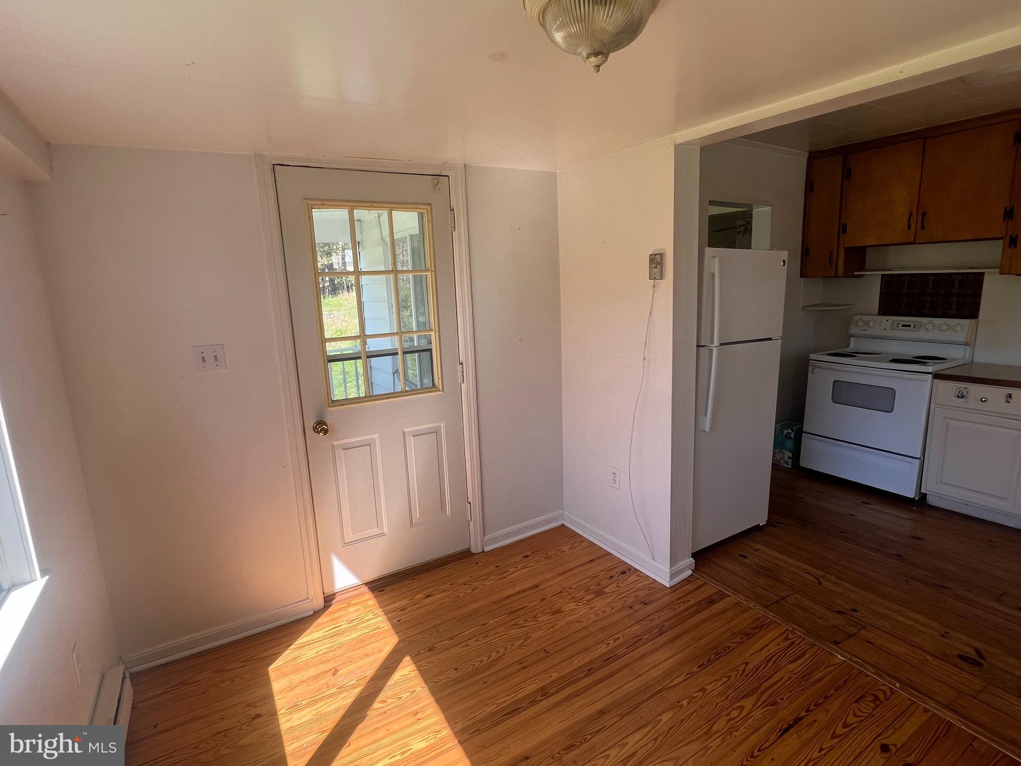 12437 Indian Springs Road Clear Spring, MD 21722 - Photo 15 of 23 Door from dining area to front porch