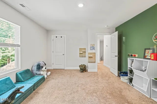a view of a balcony with wooden floor