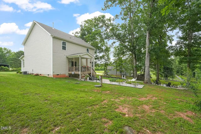 a view of a garden with patio