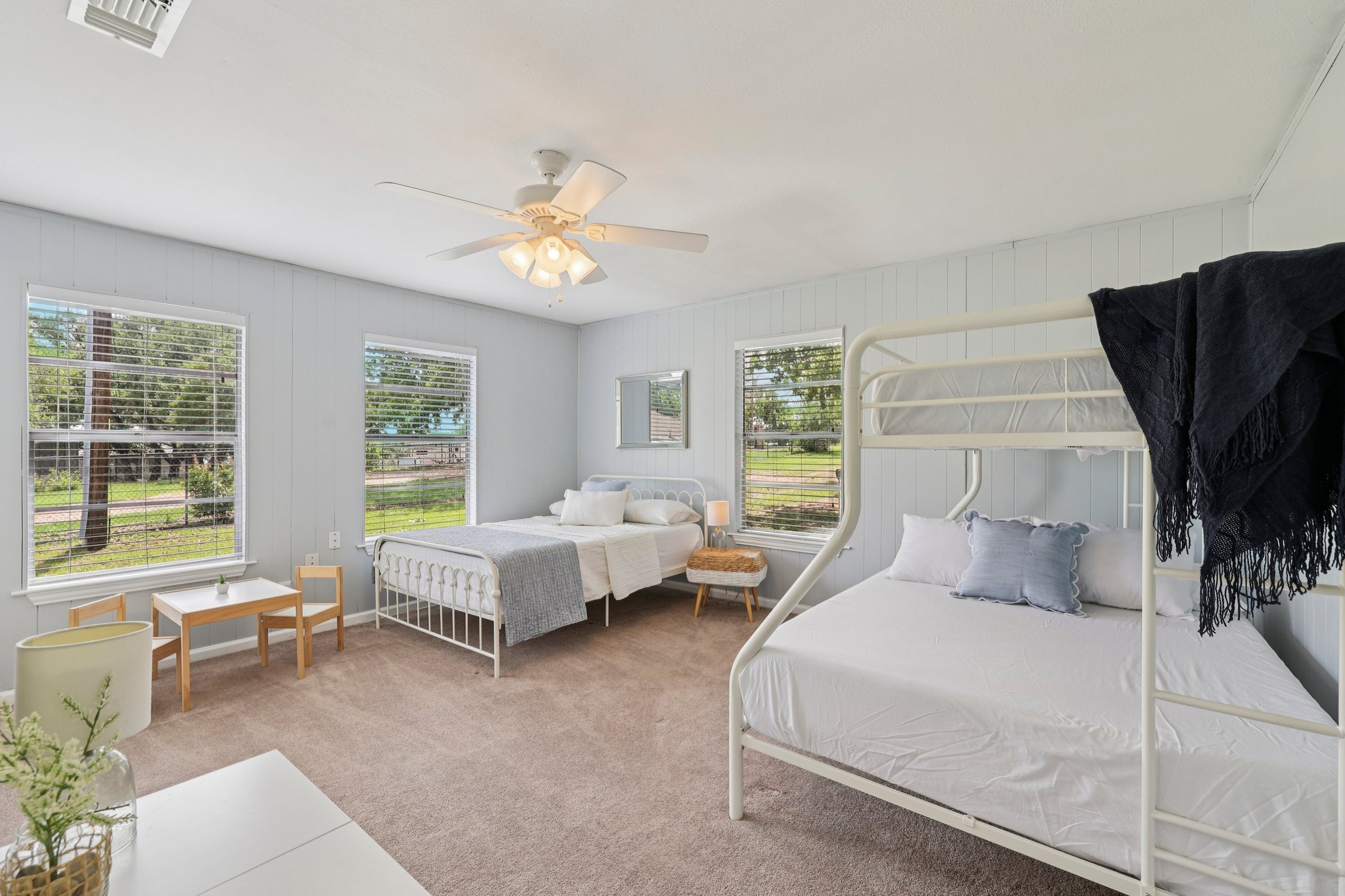 145 Oak Point Tow, TX 78672 - Photo 13 of 29 a bedroom with a bed couch and window