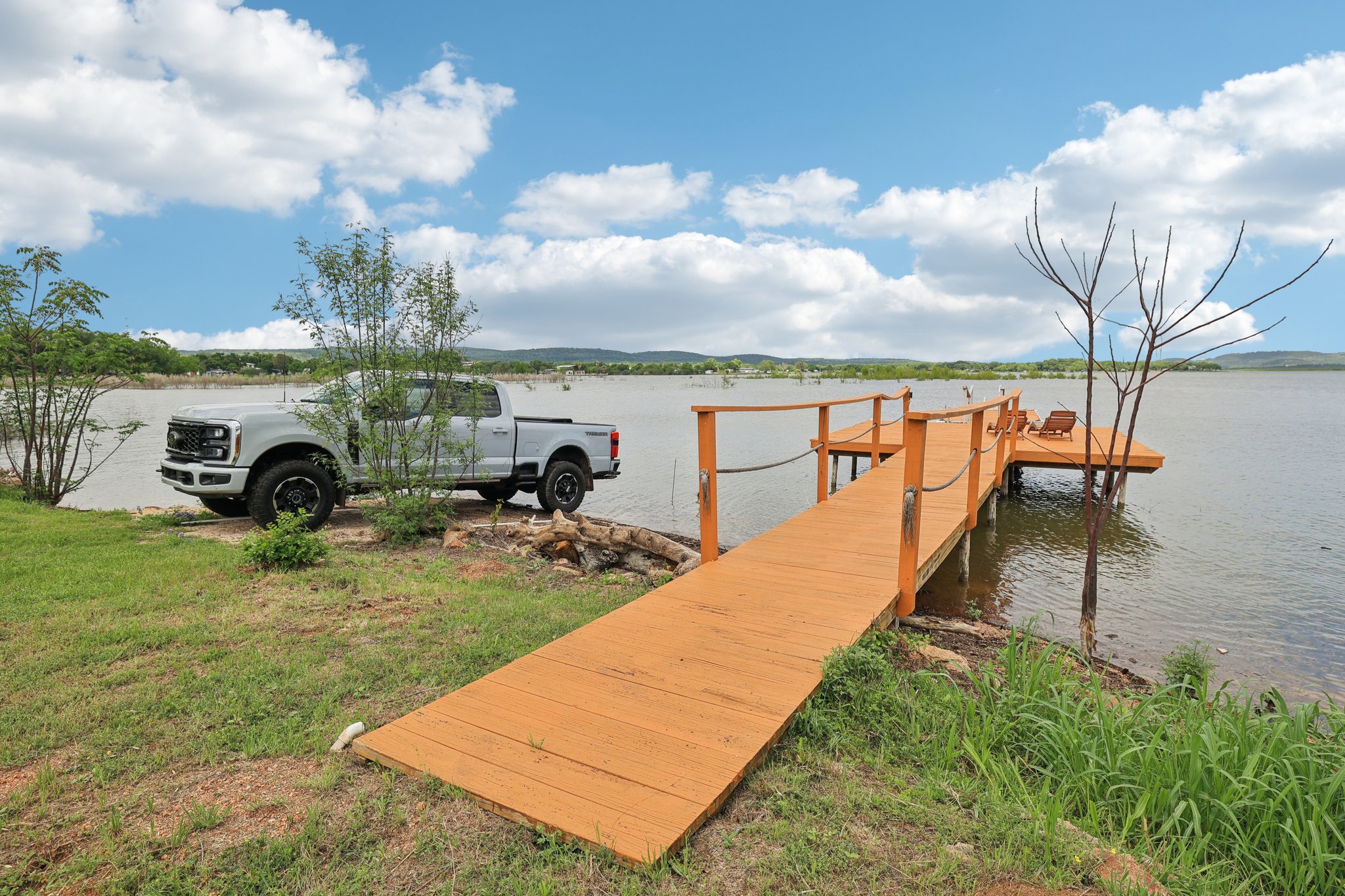 145 Oak Point Tow, TX 78672 - Photo 19 of 29 a view of a terrace with sitting area