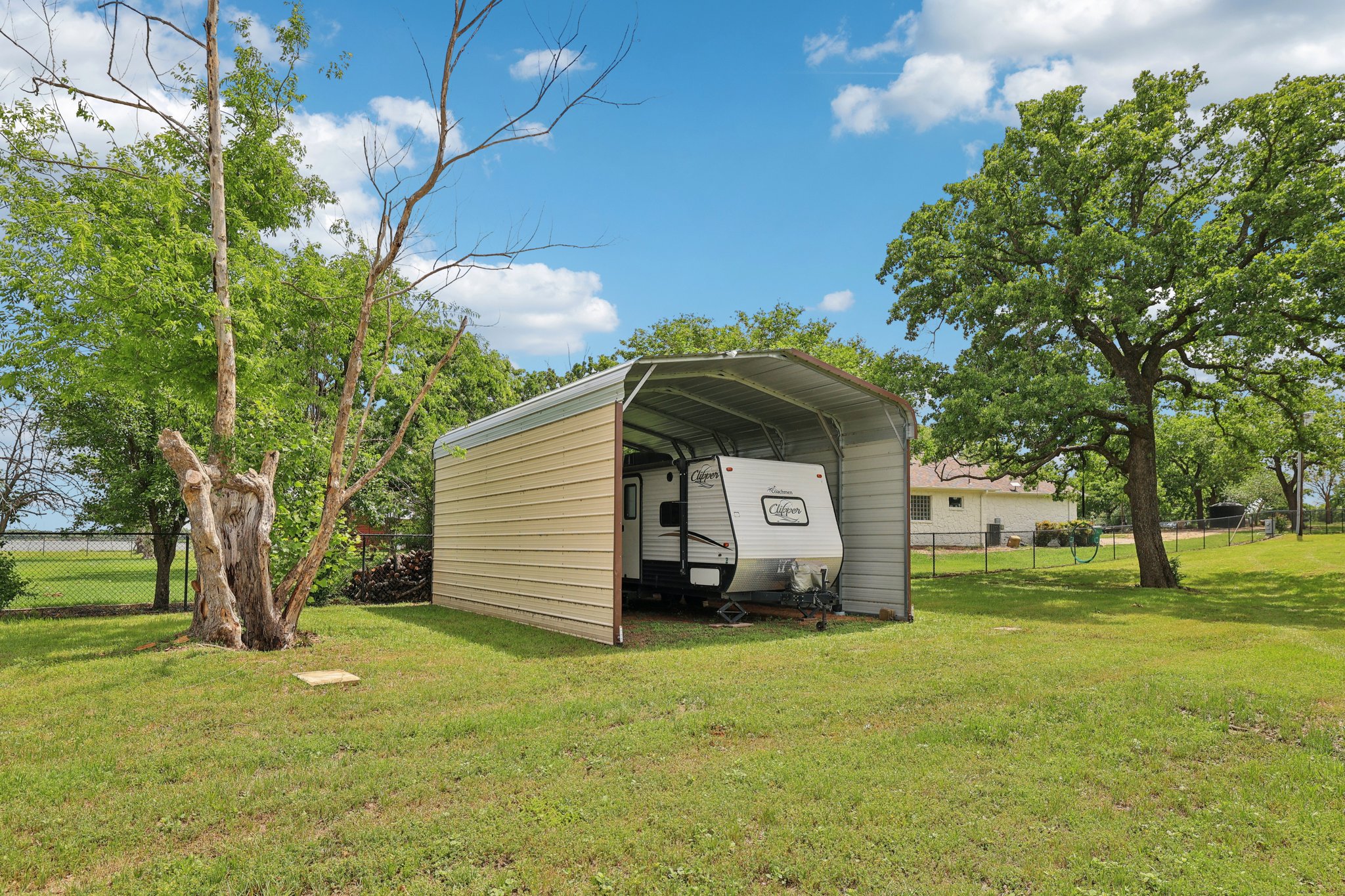 145 Oak Point Tow, TX 78672 - Photo 21 of 29 a view of a house with a yard
