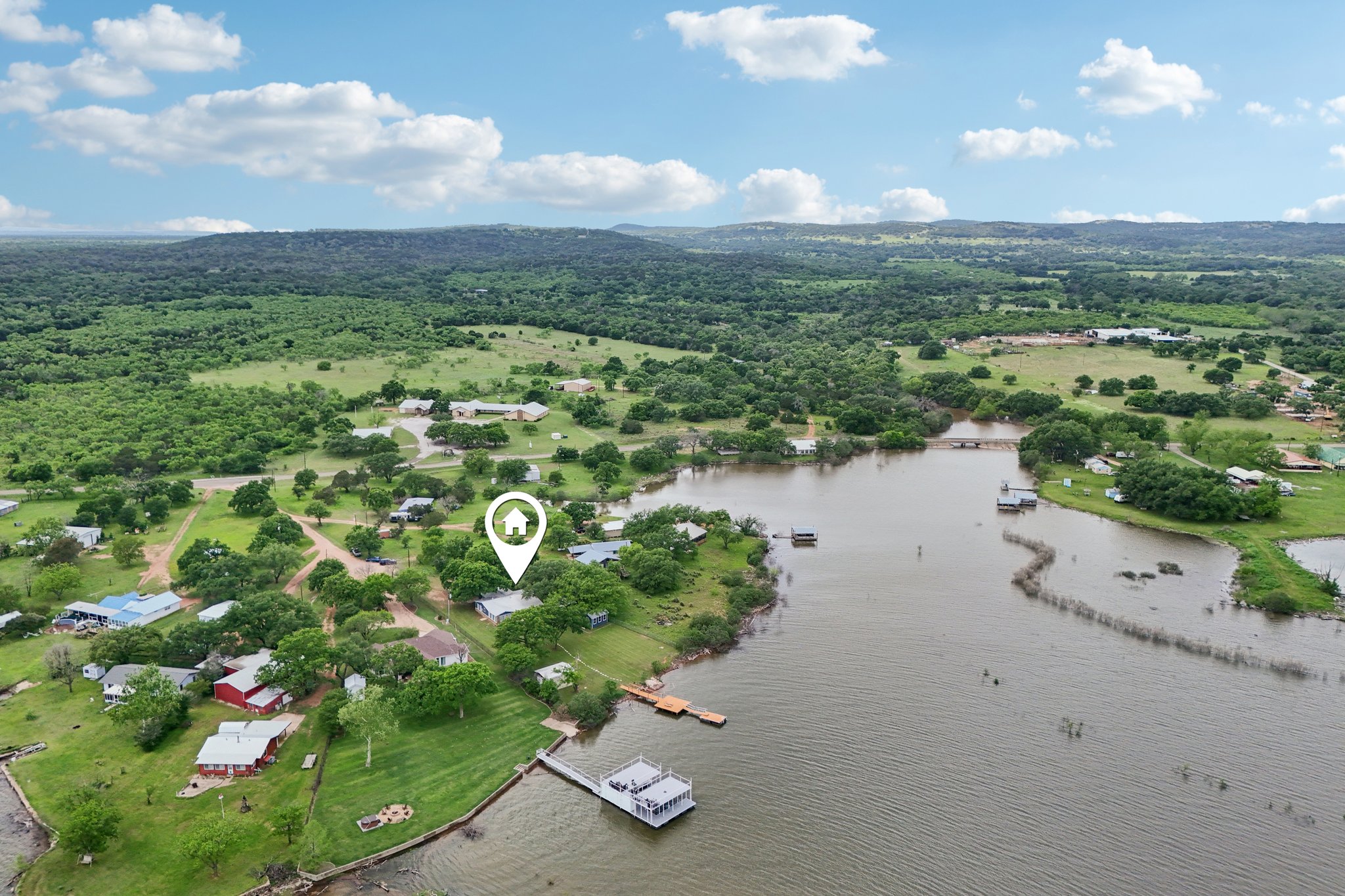 145 Oak Point Tow, TX 78672 - Photo 28 of 29 a view of a lake with a city