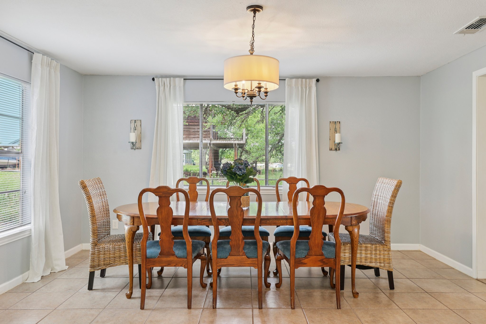 145 Oak Point Tow, TX 78672 - Photo 6 of 29 a view of a dining room with furniture window and outside view