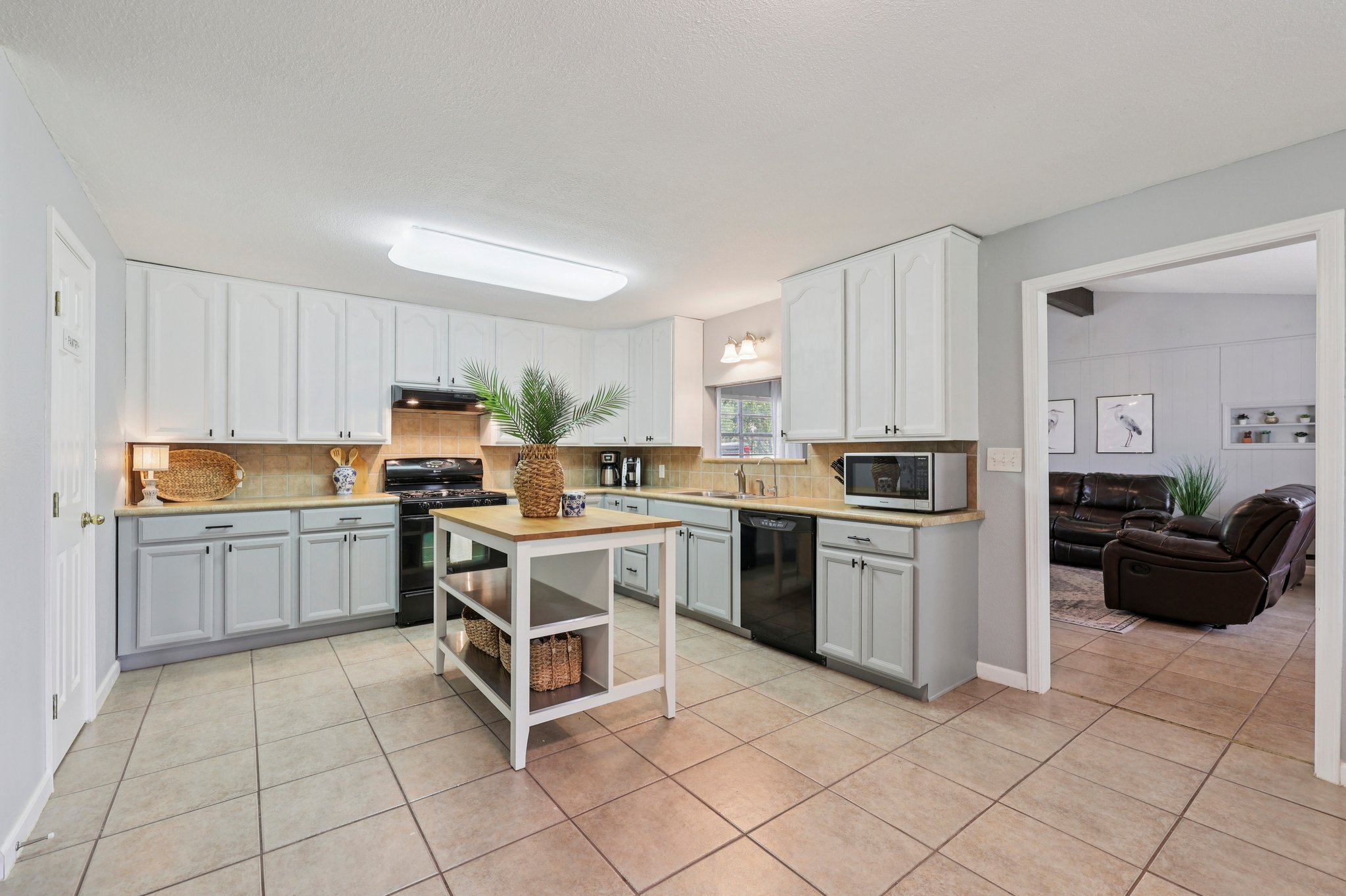 145 Oak Point Tow, TX 78672 - Photo 7 of 29 a kitchen with a cabinets and counter space