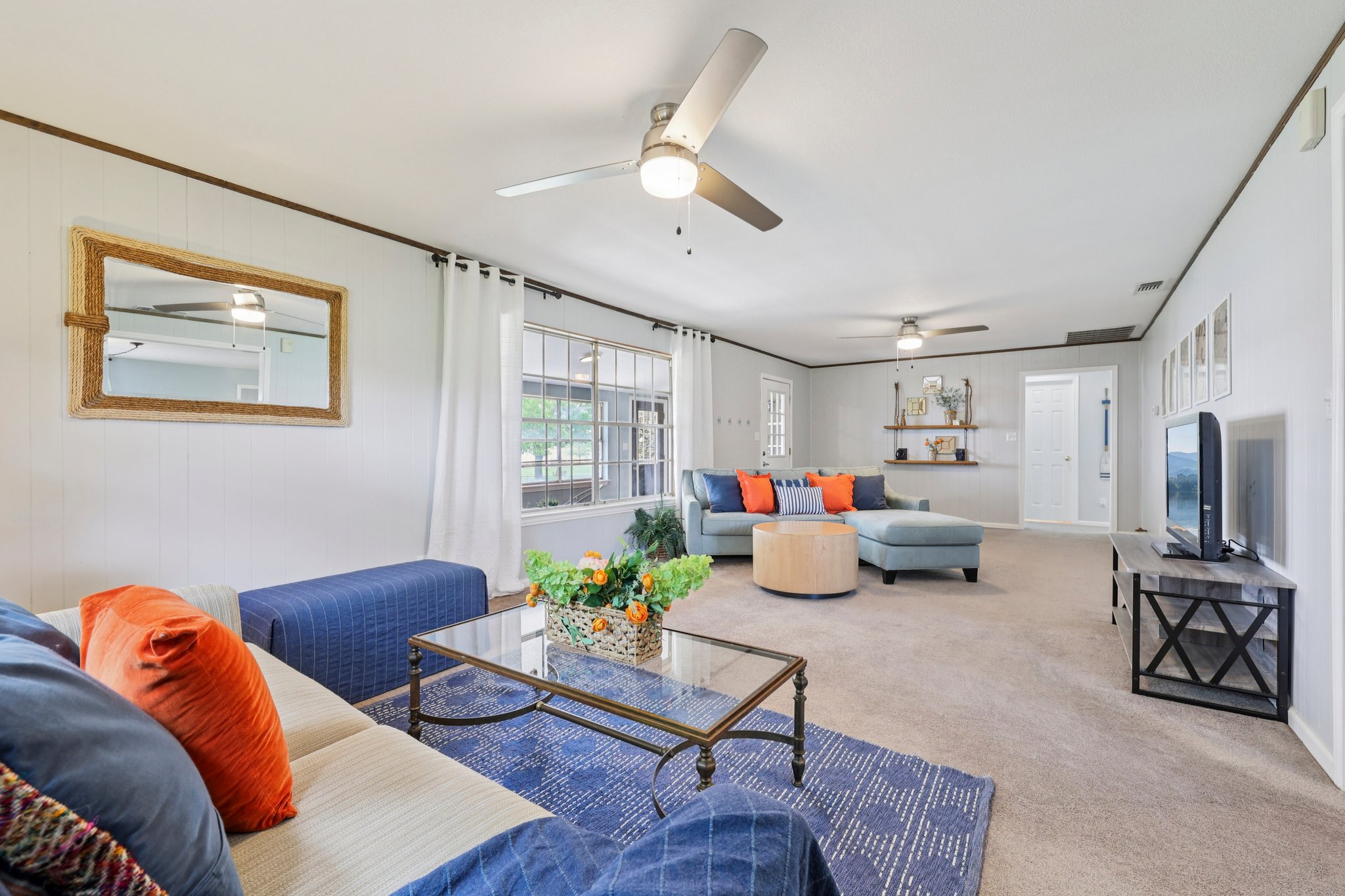 145 Oak Point Tow, TX 78672 - Photo 8 of 29 a living room with furniture and a flat screen tv