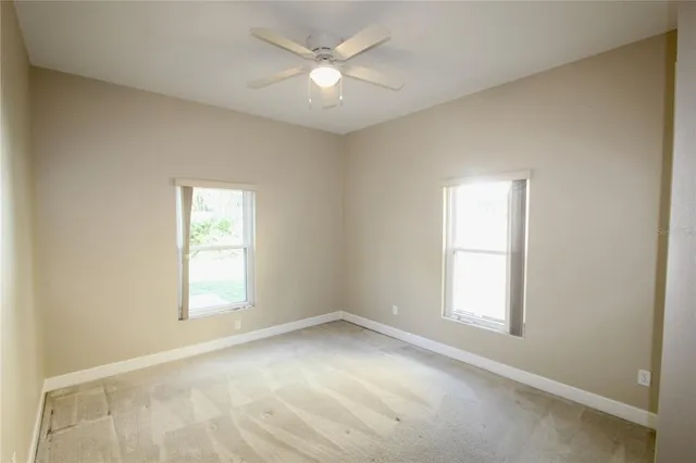a view of an empty room and window