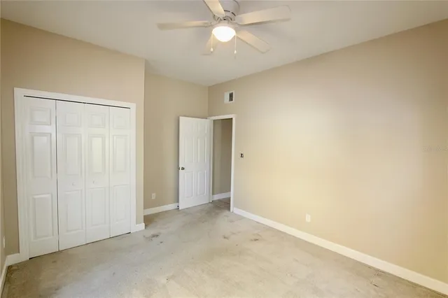 a view of a kitchen with a sink and a window
