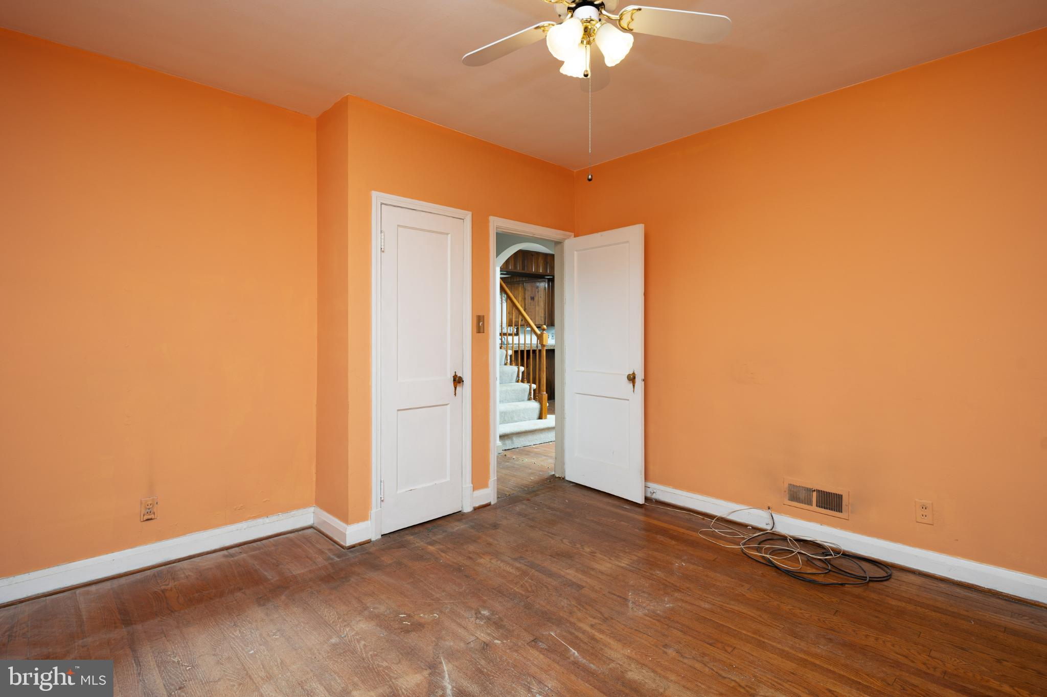 6627 Bushey Street Baltimore, MD 21224 - Photo 14 of 33 Bright orange walls invite creativity.
