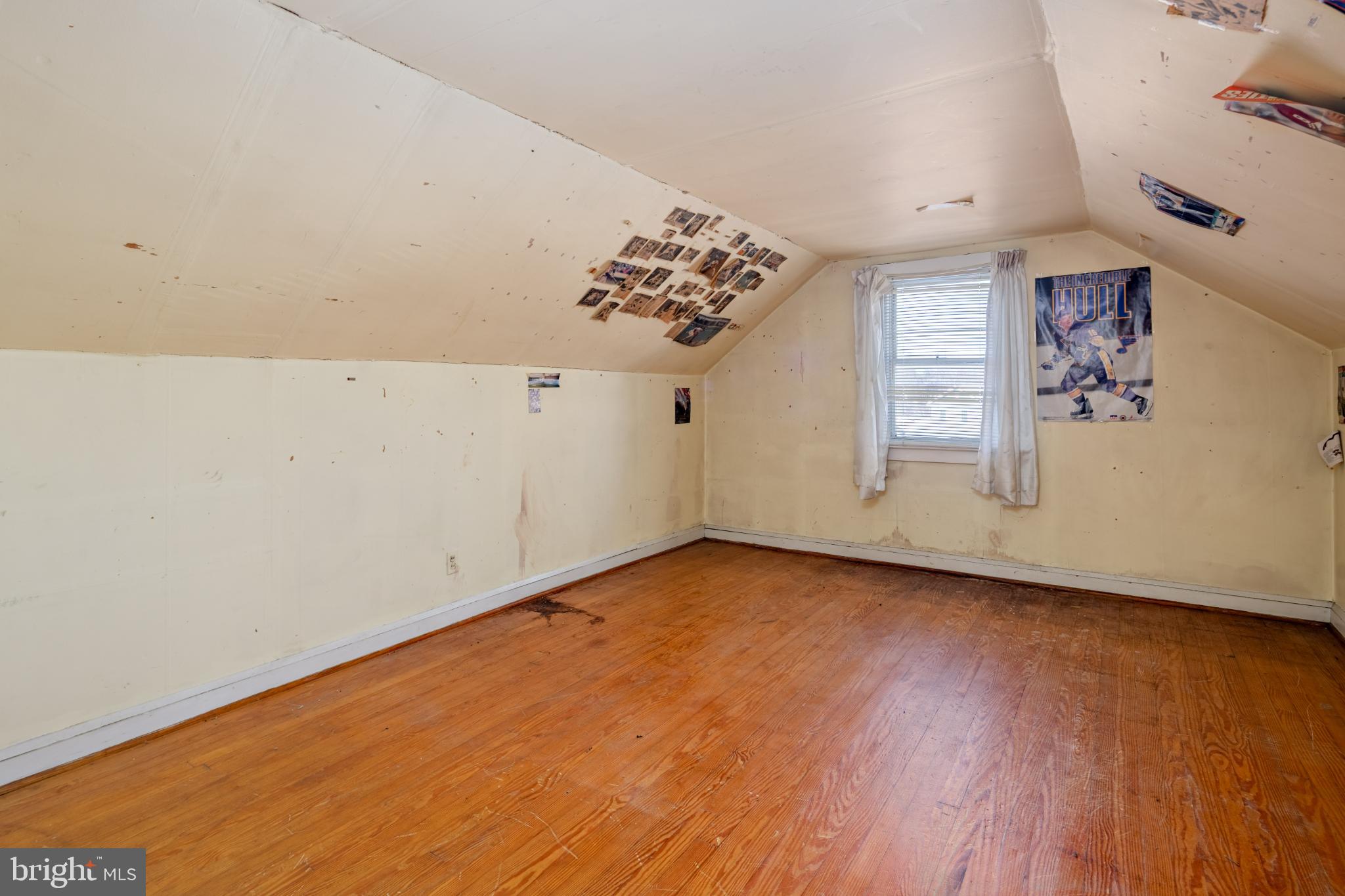 6627 Bushey Street Baltimore, MD 21224 - Photo 20 of 33 Spacious attic with natural light and charm.