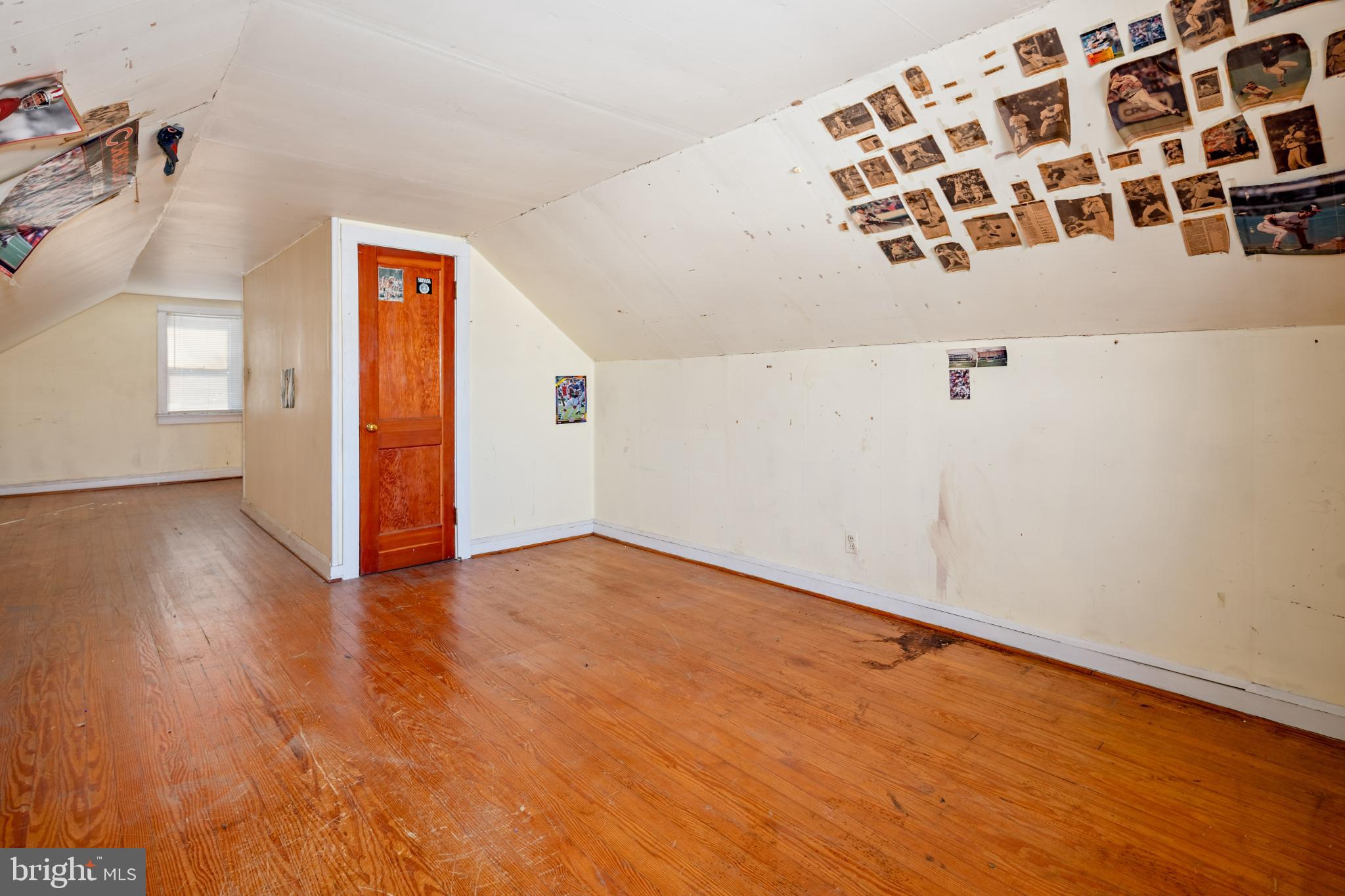 6627 Bushey Street Baltimore, MD 21224 - Photo 21 of 33 Spacious attic with charming vintage details.