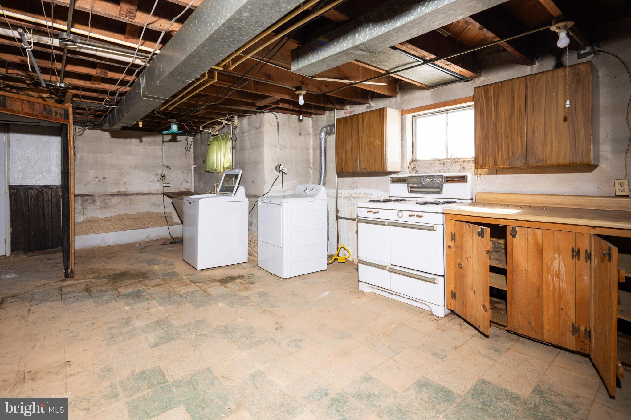 6627 Bushey Street Baltimore, MD 21224 - Photo 23 of 33 Spacious basement ready for transformation.