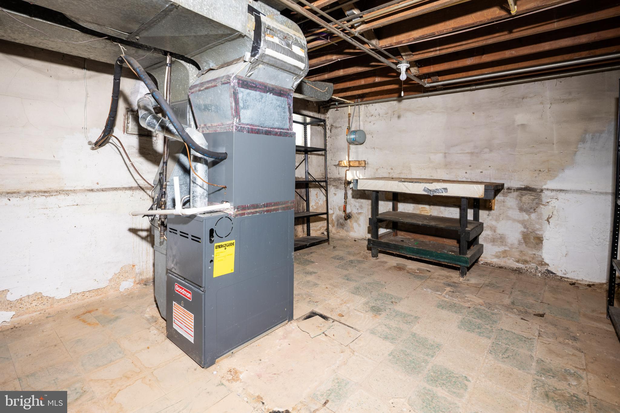 6627 Bushey Street Baltimore, MD 21224 - Photo 24 of 33 Spacious basement with utility features.
