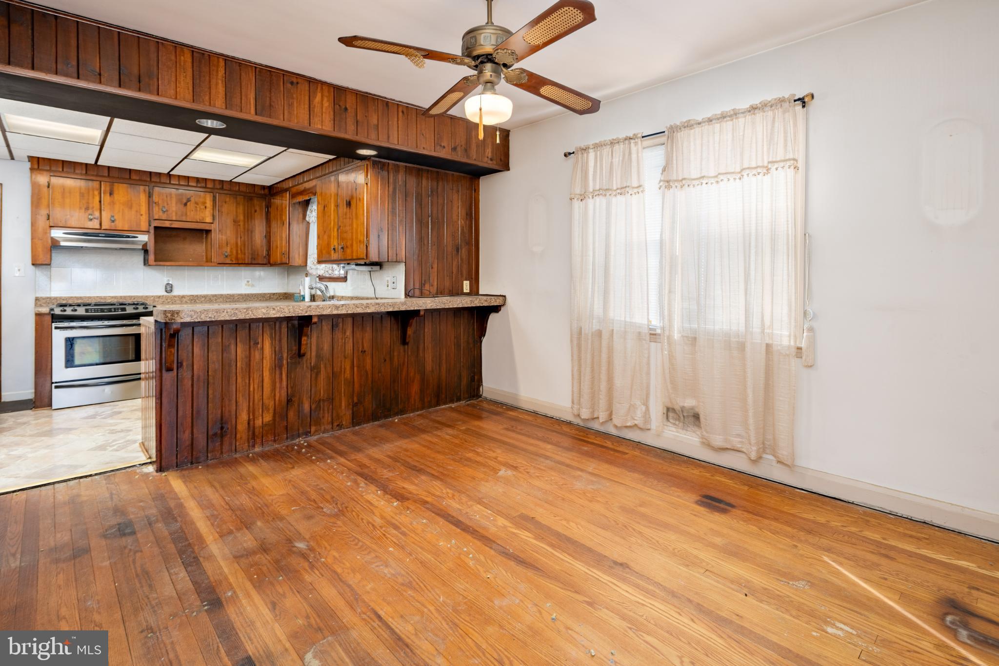 6627 Bushey Street Baltimore, MD 21224 - Photo 8 of 33 Charming space with rustic wood accents.