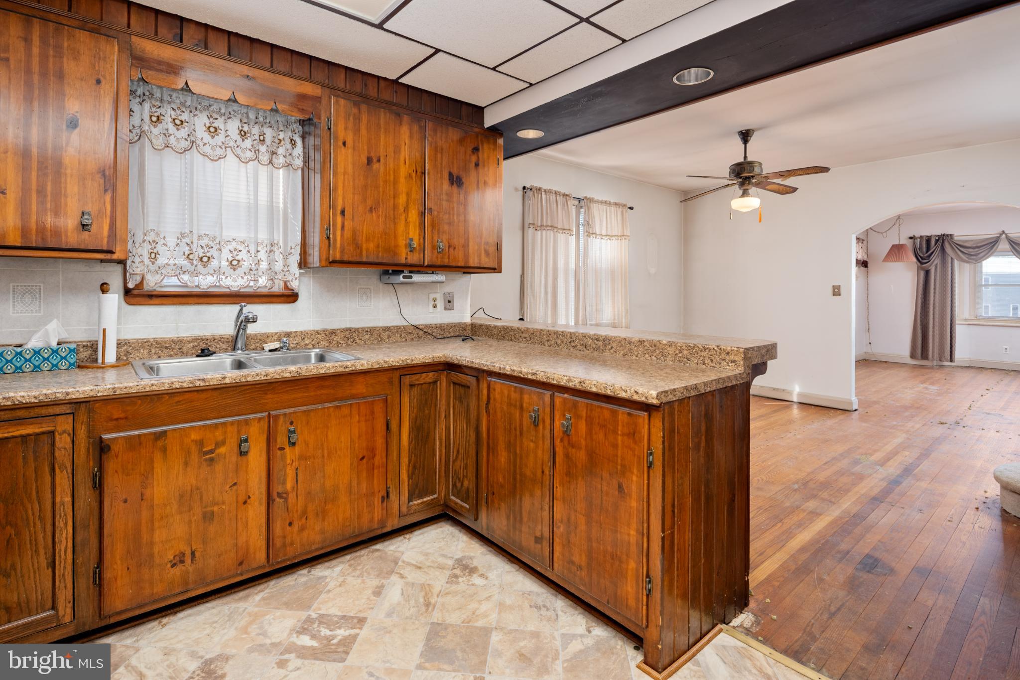 6627 Bushey Street Baltimore, MD 21224 - Photo 10 of 33 Charming kitchen with rustic wood accents.