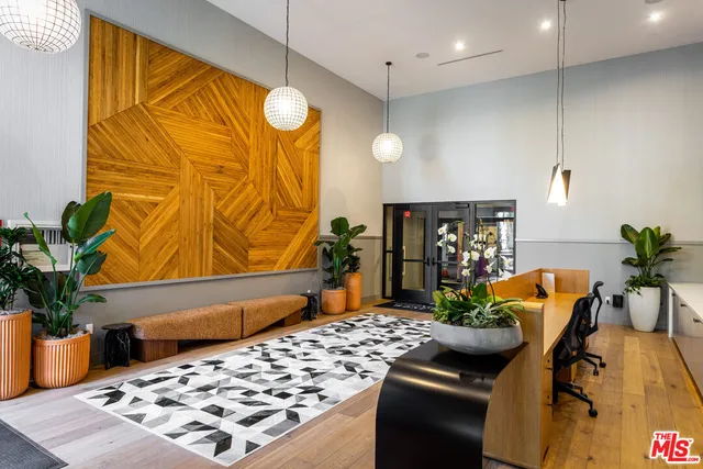 a bedroom with a bed and a table in it