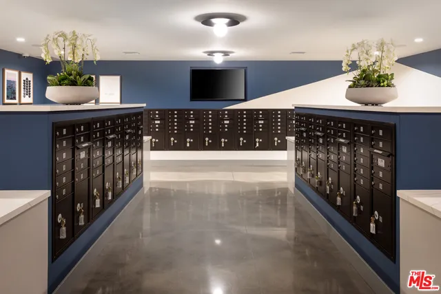 a kitchen with stainless steel appliances a sink and cabinets