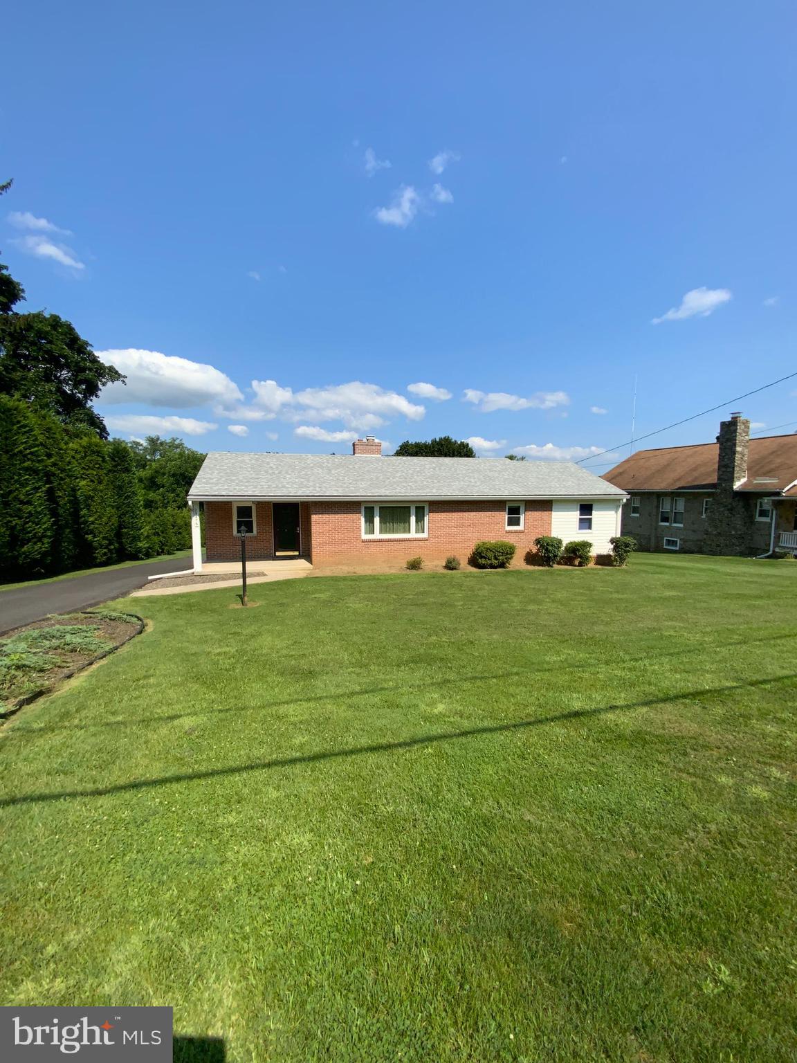 25476 Military Road Cascade, MD 21719 - Photo 1 of 30 a front view of house with yard