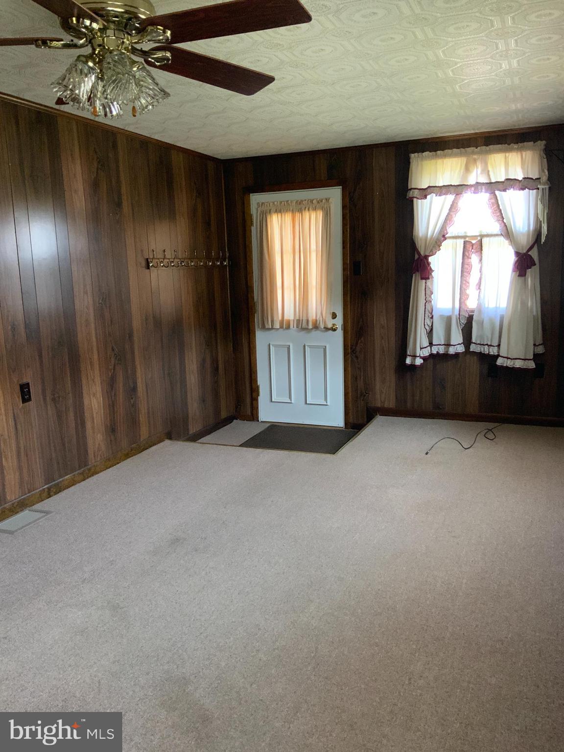 25476 Military Road Cascade, MD 21719 - Photo 18 of 30 a view of an empty room with a window
