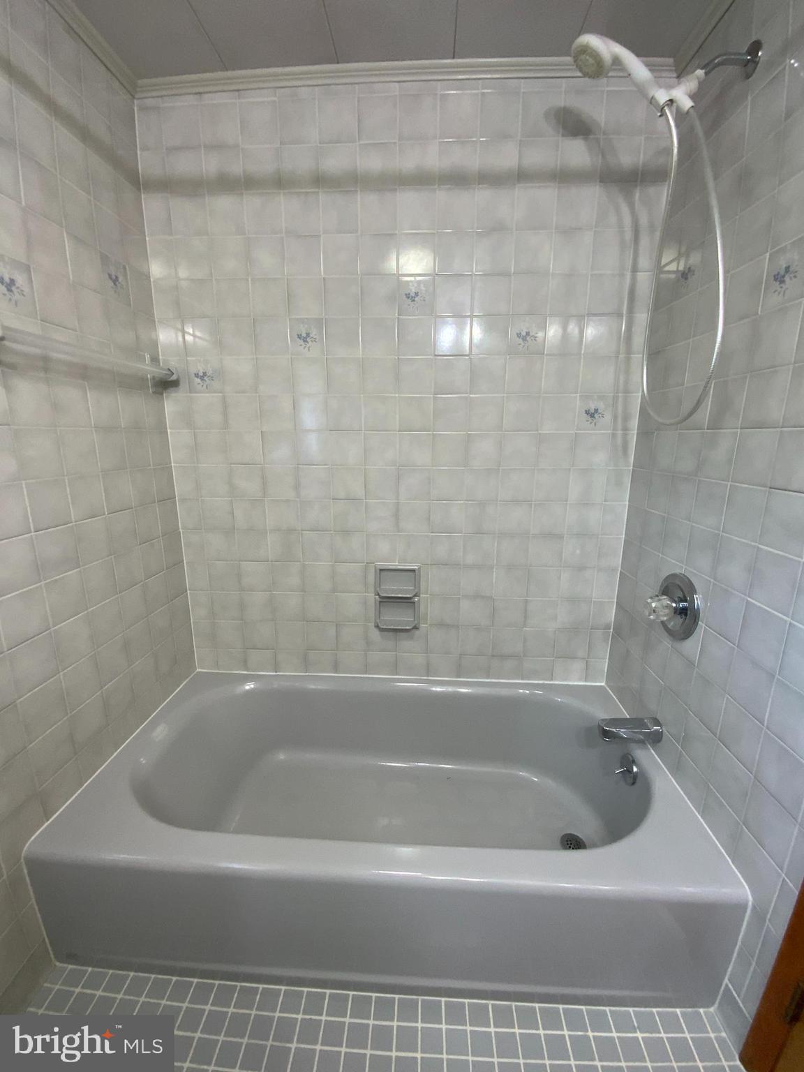 25476 Military Road Cascade, MD 21719 - Photo 24 of 30 a bath tub sitting next to a shower