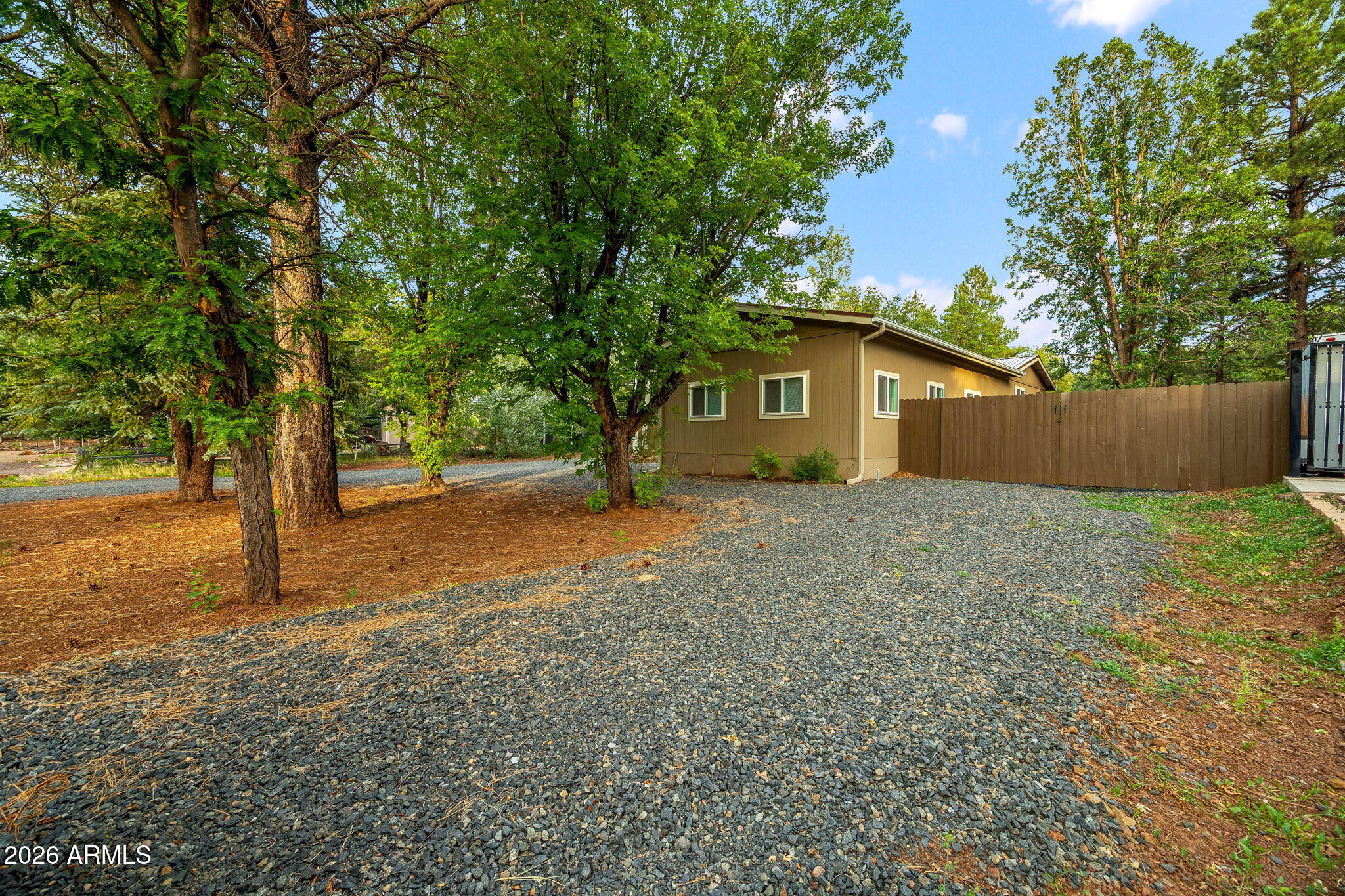 5145 Drifting Snow Loop Pinetop, AZ 85935 - Photo 28 of 37 a view of a house with a yard