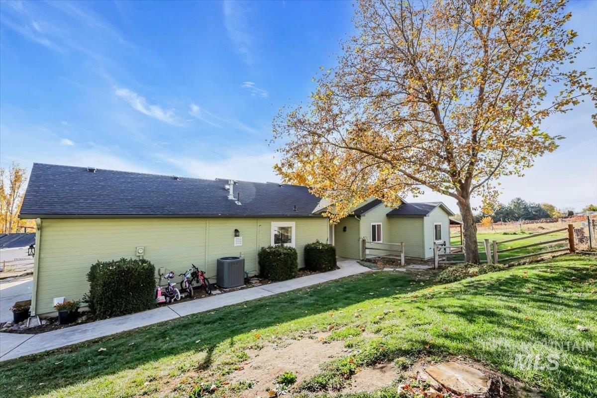 23919 Tyler Lane Middleton, ID 83644 - Photo 2 of 48 Rear view of house featuring a shingled roof