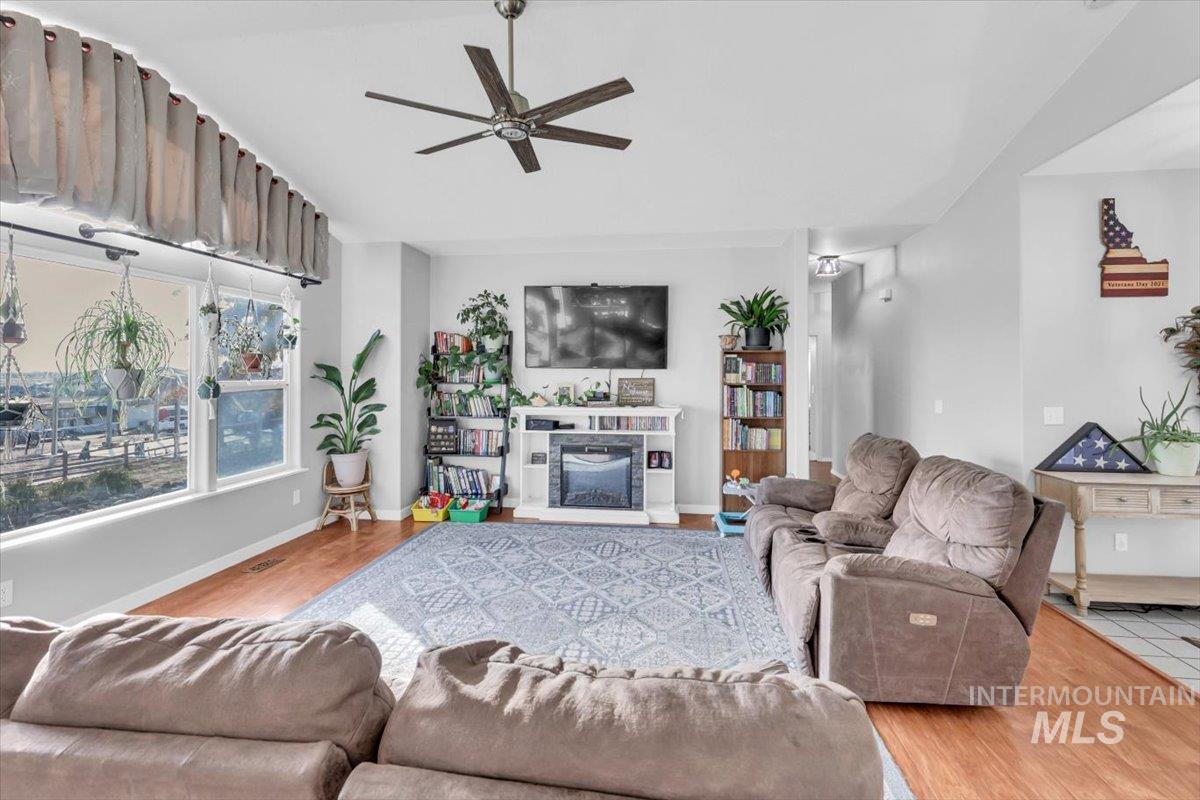 23919 Tyler Lane Middleton, ID 83644 - Photo 31 of 48 Living area with a ceiling fan and wood finished floors